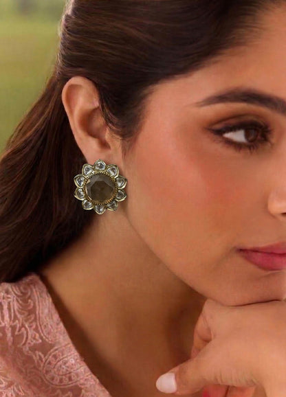 Golden polki stud earrings with traditional design