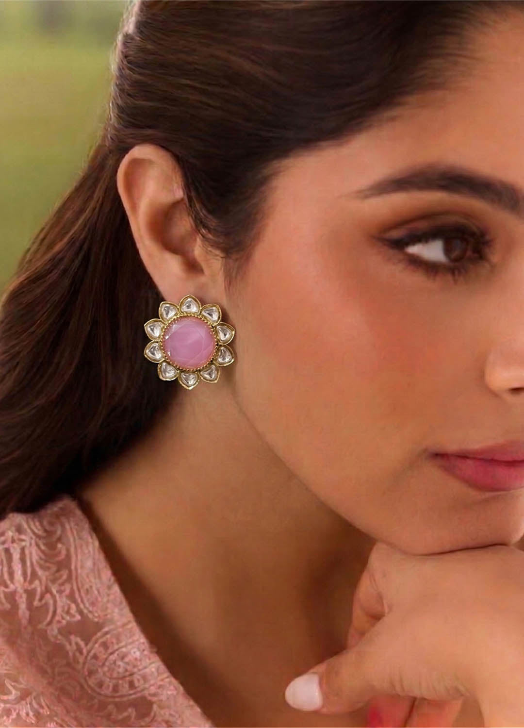Pink polki stud earrings with elegant detailing