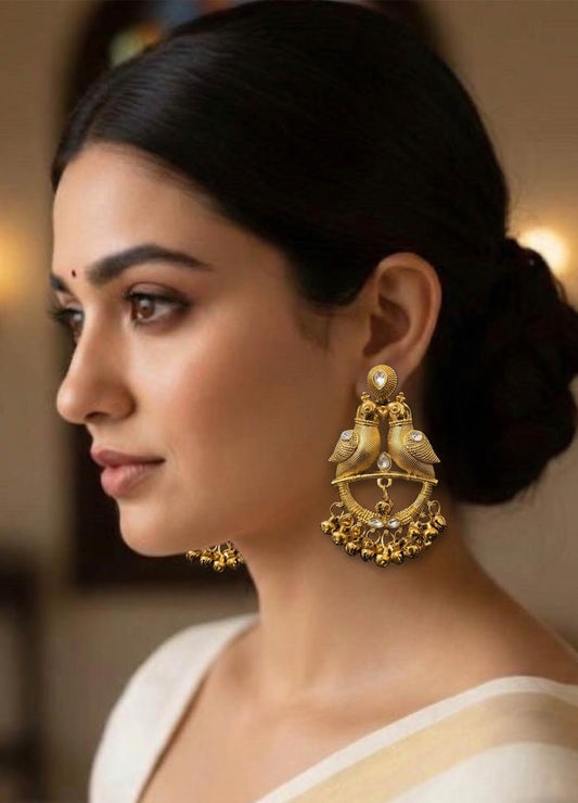 Polki Kashmiri earrings with intricate detailing