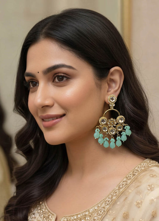 Mint green polki earrings with elegant detailing