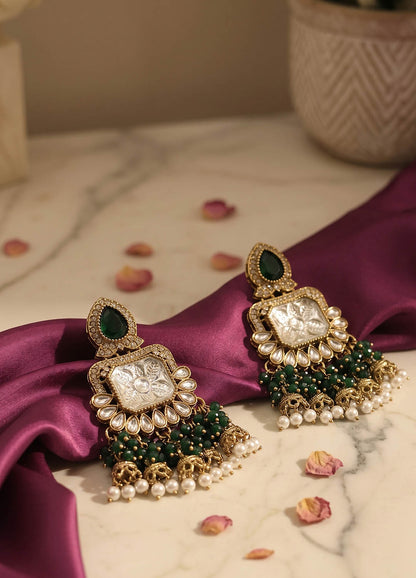 Green polki earrings with intricate design