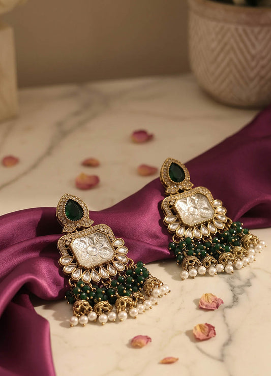 Green polki earrings with intricate design